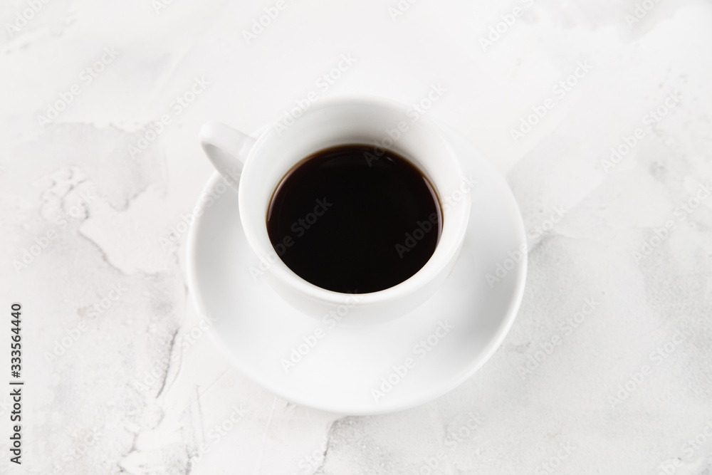 White cup of americano on a white background White cup of americano on a white background