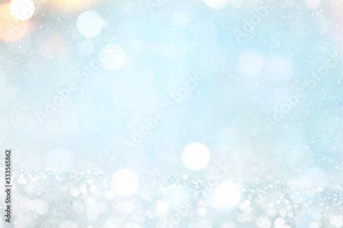 Blurred background with bokeh. Christmas and Happy New Year greeting card.