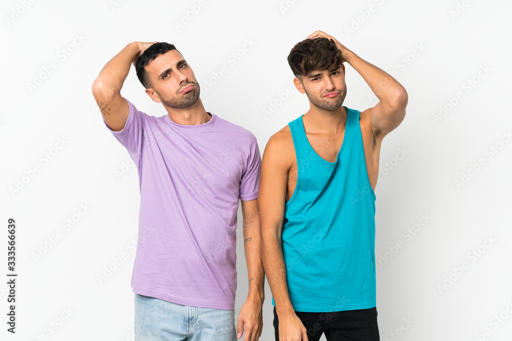 Fototapeta premium Two men over isolated background with an expression of frustration and not understanding