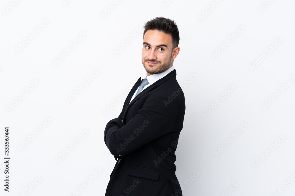 Young business man over isolated background laughing