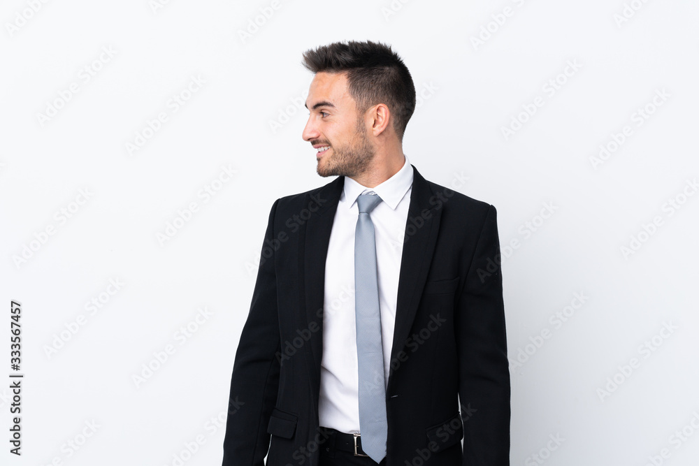 Young business man over isolated background looking to the side Young business man over isolated background looking to the side