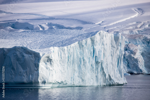Iceberg floating in Atlantic Ocean Antarctic Peninsular © Ken Griffiths