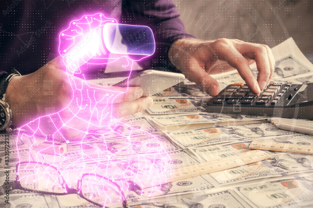 Double exposure of man's hands holding and using a digital device and AR glasses drawing. Virtual reality concept. Double exposure of man's hands holding and using a digital device and AR glasses drawing. Virtual reality concept.