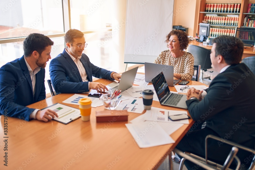 Business lawyers workers meeting at law firm office. Professional executive partners working on finance strategry at the workplace Business lawyers workers meeting at law firm office. Professional executive partners working on finance strategry at the workplace