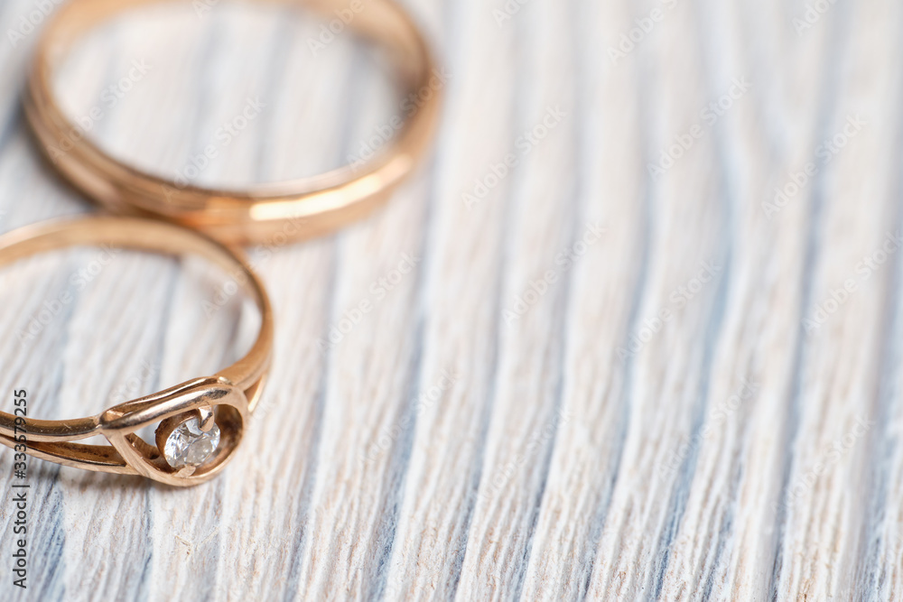 Wedding rings on a wooden table. Wedding rings on a wooden table.