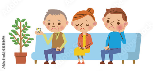 歯科医院の待合室で不安そうな表情で待つ患者3人