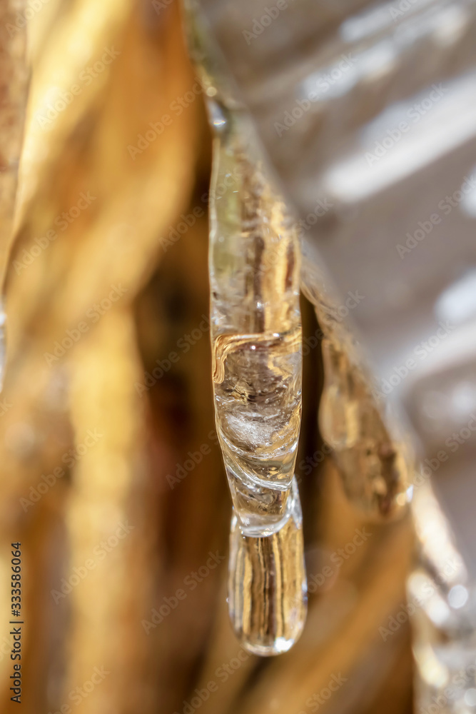 Close up shot of long tiny icicle