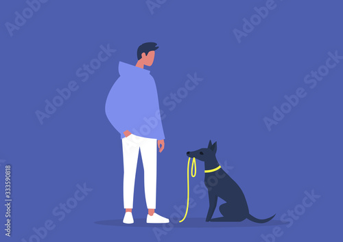 Cute black skinny puppy insisting on a walk, domestic life, young male owner with their dog