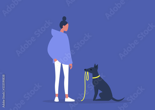 Cute black skinny puppy insisting on a walk, domestic life, young female owner with their dog
