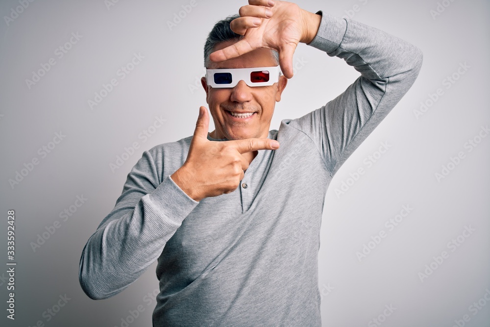 Middle age handsome grey-haired man using 3d glasses over isolated white background smiling making frame with hands and fingers with happy face. Creativity and photography concept. Middle age handsome grey-haired man using 3d glasses over isolated white background smiling making frame with hands and fingers with happy face. Creativity and photography concept.