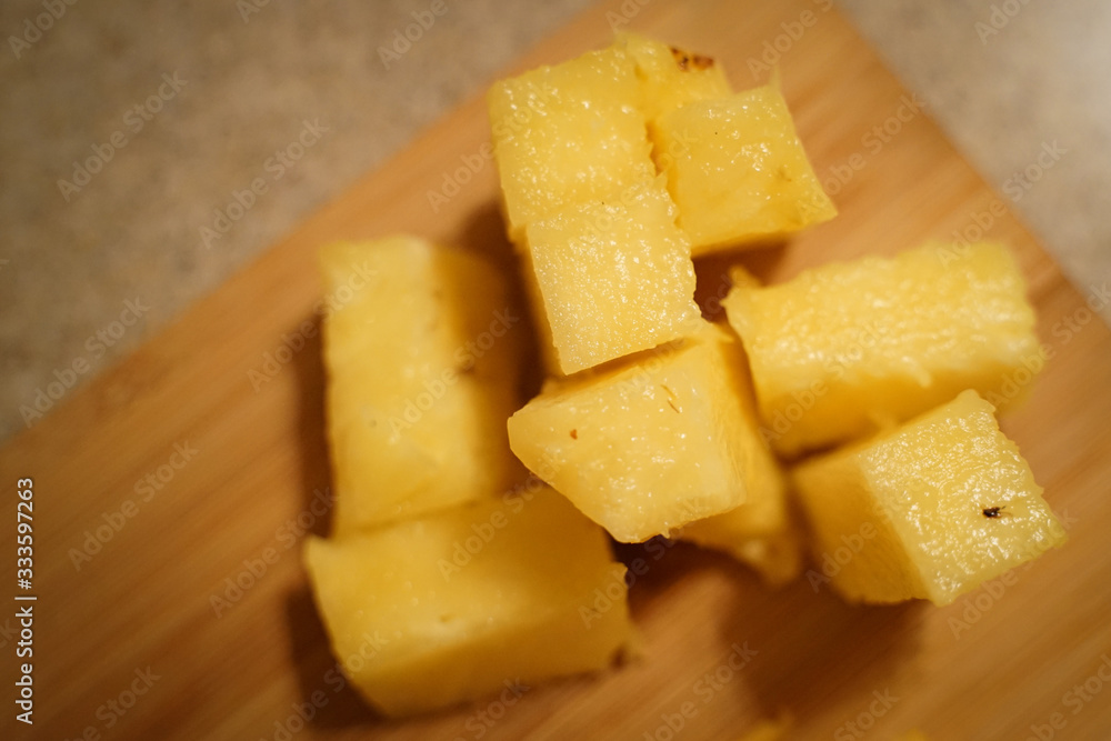 Pineapple Sliced on the wooden board Pineapple Sliced on the wooden board