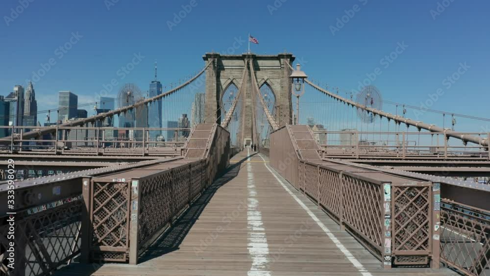 moving forward along empty pedestrian path on Brooklyn Bridge corona quarantine moving forward along empty pedestrian path on Brooklyn Bridge corona quarantine