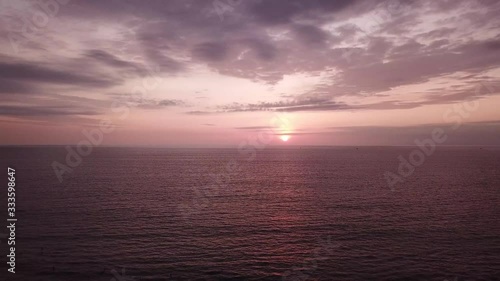 Sunset over the ocean areal view in Olon Ecuador. photo