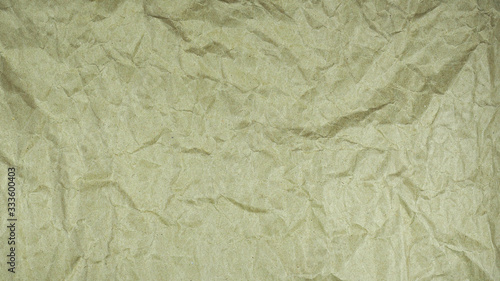 Brown wrinkled paper. Abstract texture background.