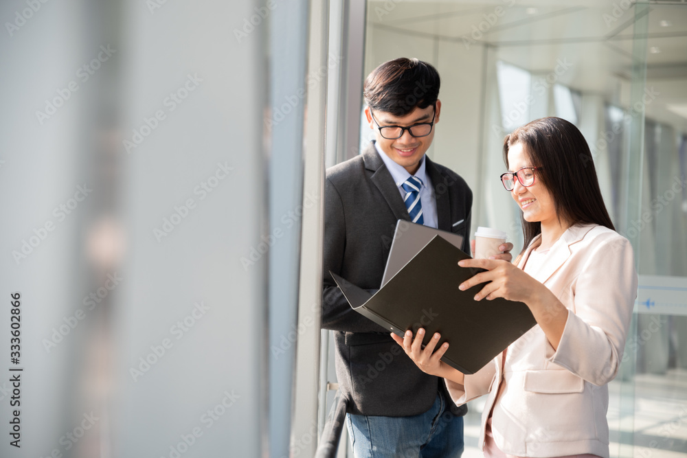 Group of business partners discussing ideas and planning work out of office. Business people talking discussing concept. Group of business partners discussing ideas and planning work out of office. Business people talking discussing concept.