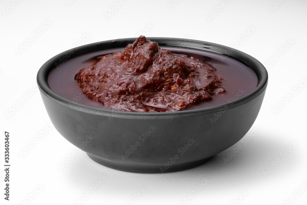 Chinese chili called Mala , paste, sauce , dried seed with dried red chili ,ingredient for Mala grilled street food ,isolated on white background Chinese chili called Mala , paste, sauce , dried seed with dried red chili ,ingredient for Mala grilled street food ,isolated on white background