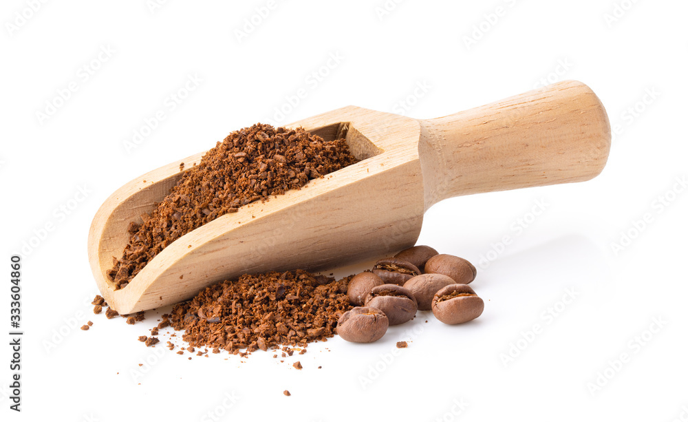 coffee powder in wood scoop on white background coffee powder in wood scoop on white background