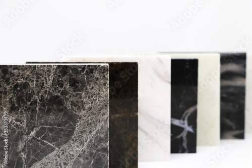 Close up group of stone marble on white background, stone material for interior designer, texture surface of marble with copy space
