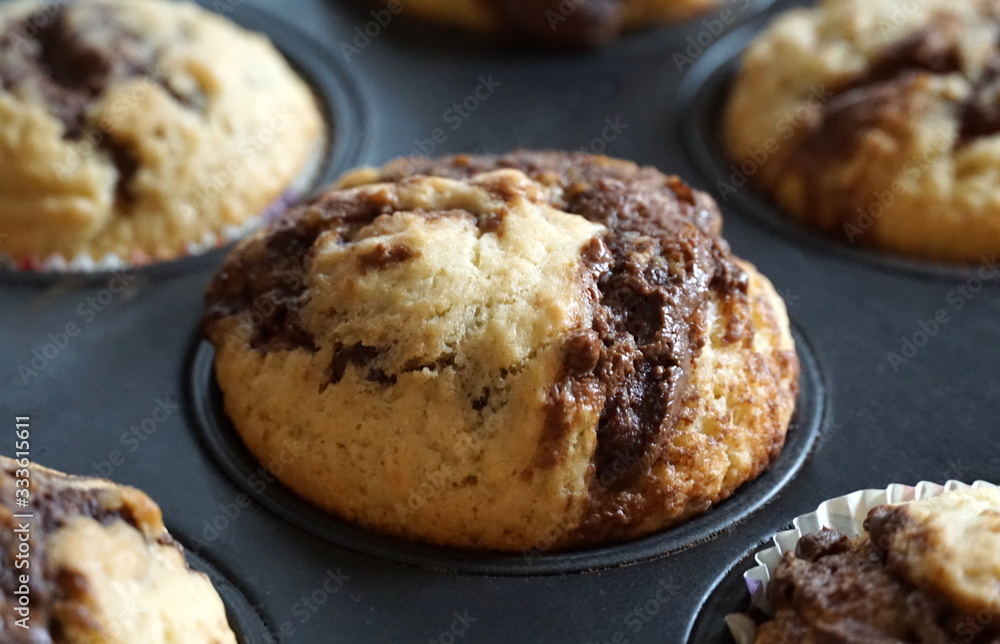 Tasty homemade cake muffin with chocolate, close up view