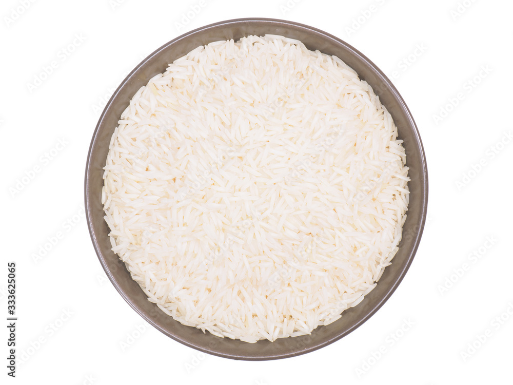 Indian long grain Basmati rice in brown ceramic bowl isolated on white ...