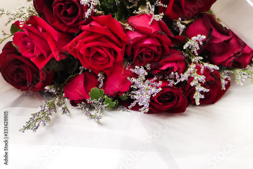 Red bouquet roses for sweet couple in Valentine period