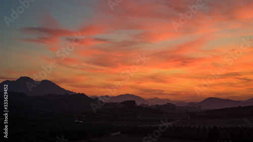 Wallpaper Mural Amazing warm sunset light in the clouds over spanish hills of Valenciana region Torontodigital.ca