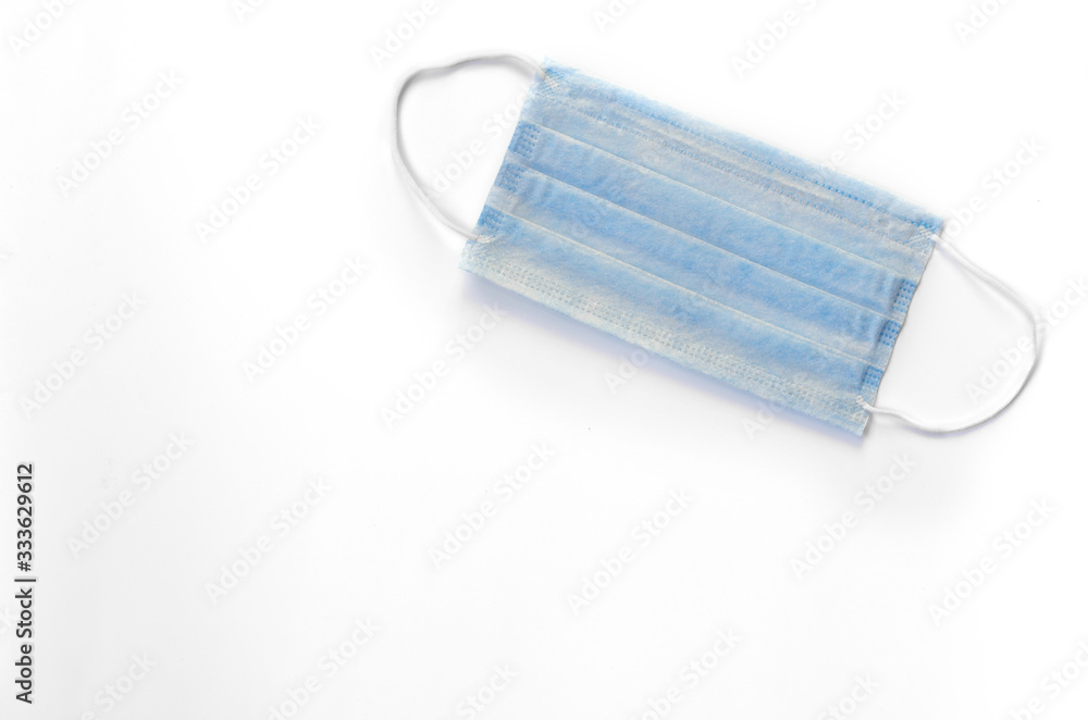 Medical fabric mask on a white background. Isolate. Protection from coronavirus. Covid-19. Protection during the epidemic. Medical fabric mask on a white background. Isolate. Protection from coronavirus. Covid-19. Protection during the epidemic.