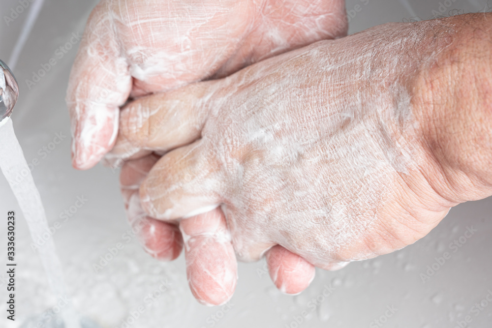 A man washing his hands