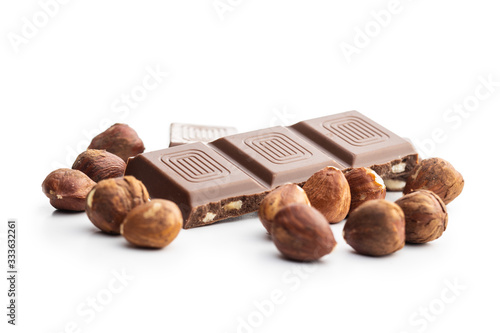 Milk chocolate bars and hazelnuts