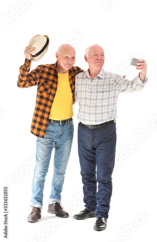 Portrait of elderly men tak...