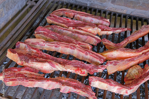 Typical argentinean asado parillada BBQ on a grill in Uruguay, also seen in Argentina, Brazil and Chile