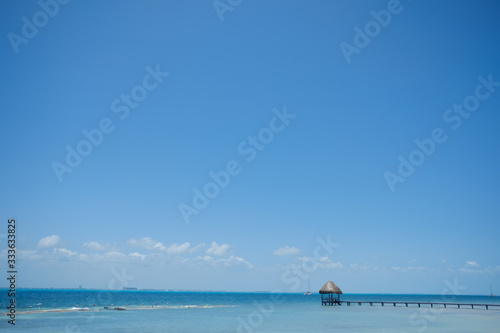 empty wooden pier and full ocean view. © Make_story Studio