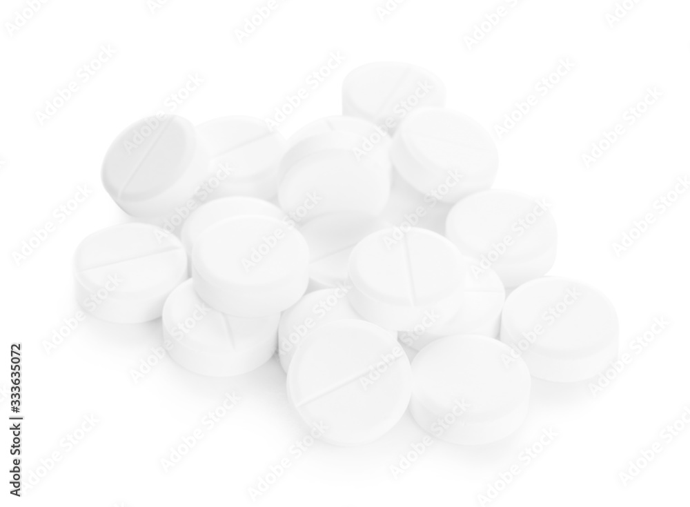 Heap of pills on white background