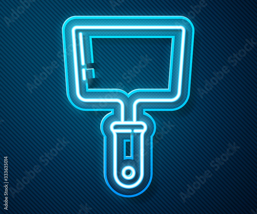 Glowing neon line Putty knife icon isolated on blue background. Spatula repair tool. Spackling or paint instruments. Vector Illustration