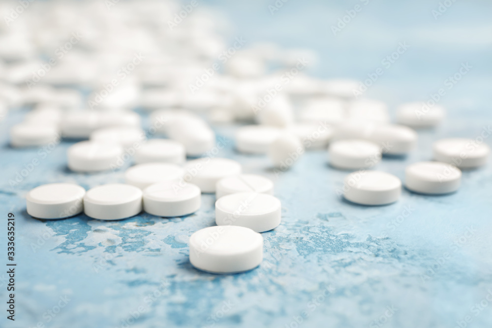 Many pills on color background Many pills on color background