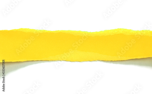 ripped yellow paper isolated on white background