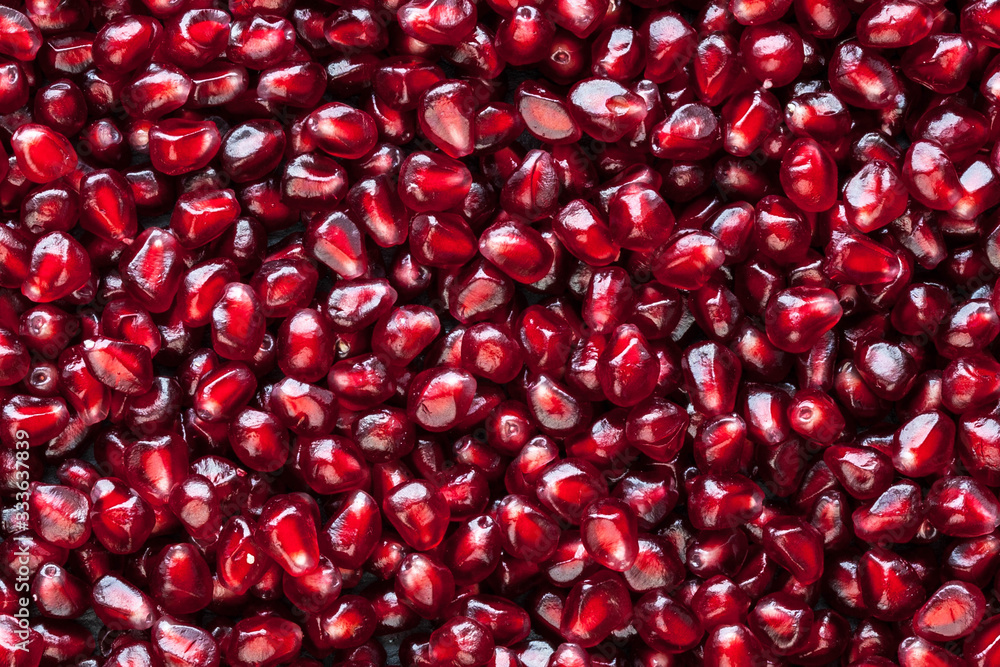 A lot of peeled pomegranate's seed A lot of peeled pomegranate's seed