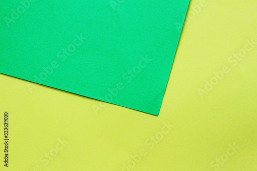 sheet green and yellow paper texture background, copy space for text.