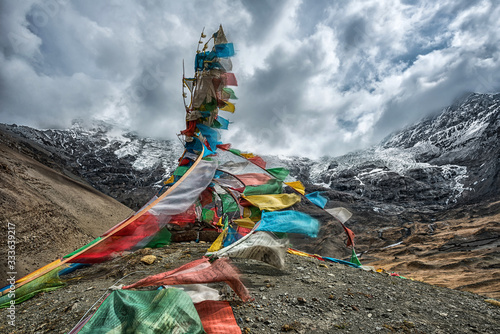 Bild auf Leinwand Tibetan prayer flags fluttering in the wind
