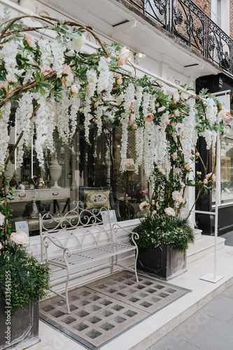 Photography LONDON, UNITED KINGDOM - MAY 20th, 2019: Shop decorated with flowers in Belgravia, London