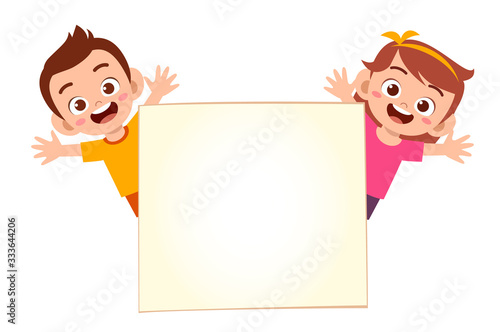 happy cute little kid boy and girl with blank banner