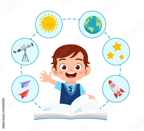 happy cute little kid school boy read book
