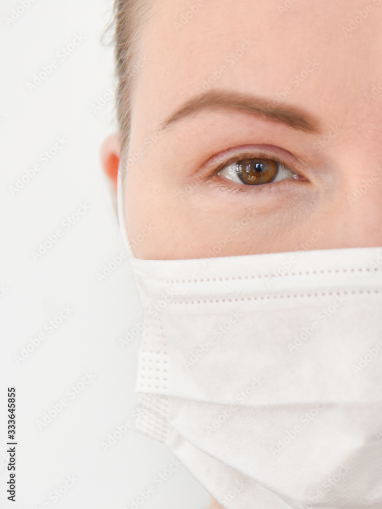 the face of a man in a medical mask the face of a man in a medical mask