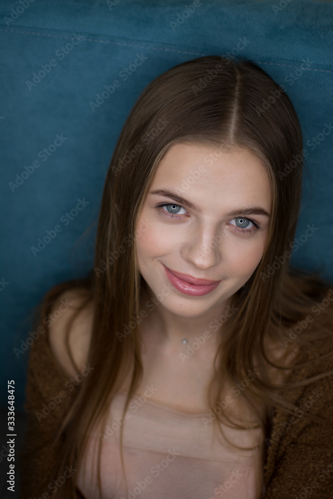 Naklejka premium girl smile portrait earrings youth beauty model look hands