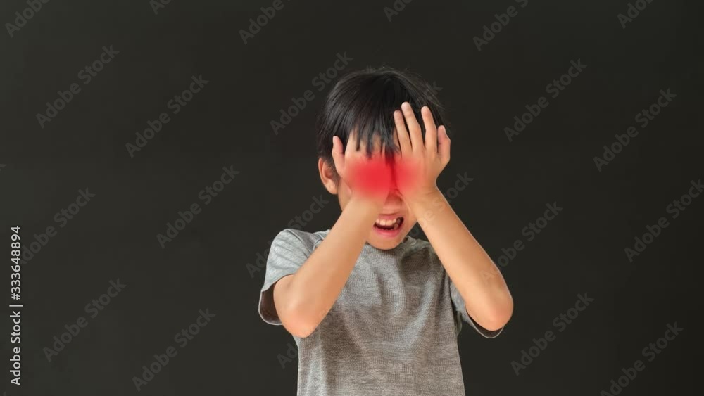 k young Asian boy has headache and eye problem with red animation zone. k young Asian boy has headache and eye problem with red animation zone.