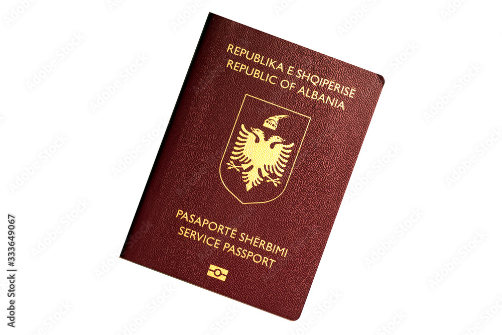 Red biometric service passport of Albania isolated on white background Red biometric service passport of Albania isolated on white background