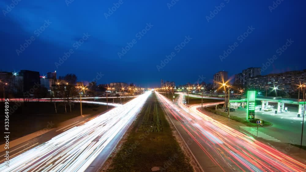 Highway with car trails. Highway in dusk with cars leaving behind light lines. Aerial view. Highway with car trails. Highway in dusk with cars leaving behind light lines. Aerial view.