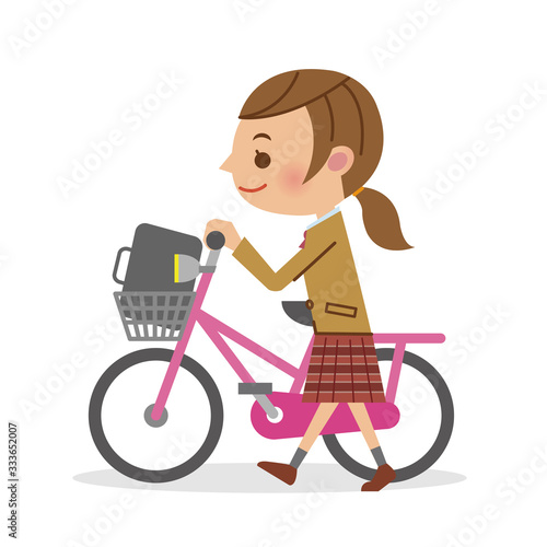 自転車を押し歩きする女子生徒