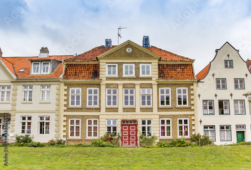 Historic houses on the dike in Gluckstadt, Germany