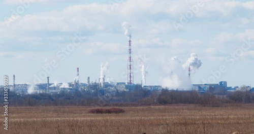 Smoke from the chimneys of a chemical plant. Plant for the production of mineral fertilizers. 